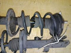 Стойка амортизатора на Toyota Noah AZR65G 1AZ-FSE Фото 3