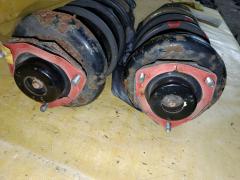 Стойка амортизатора на Nissan X-Trail NT30 QR20DE Фото 2