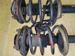 Стойка амортизатора на Nissan X-Trail NT30 QR20DE Фото 3