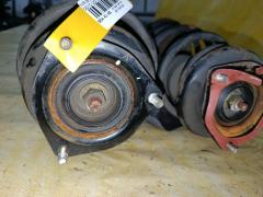 Стойка амортизатора на Nissan Bluebird Sylphy QG10 QG18DE Фото 2