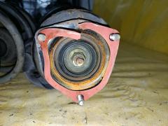 Стойка амортизатора на Nissan Bluebird Sylphy QG10 QG18DE Фото 3