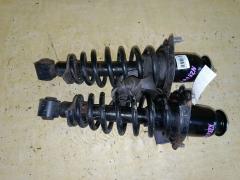 Стойка амортизатора на Toyota Corolla Fielder NZE144G 1NZ-FE, Заднее расположение