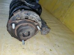 Стойка амортизатора на Toyota Noah AZR65G 1AZ-FSE Фото 2