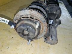 Стойка амортизатора на Toyota Noah AZR65G 1AZ-FSE Фото 5