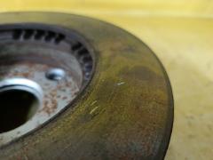 Тормозной диск на Mazda Familia S-Wagon BJ5W ZL Фото 3