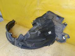 Подкрылок 63842-3VA0A на Nissan Note E12 HR12DDR Фото 2