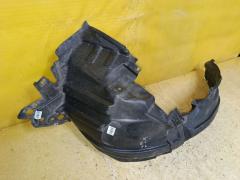 Подкрылок 63843-3VA0A на Nissan Note E12 HR12DDR Фото 2