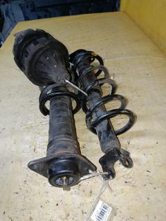 Амортизатор 56210-JK00C на Nissan Skyline V36 Фото 2