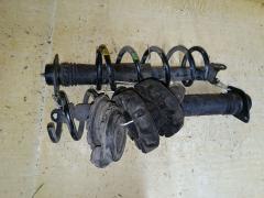 Амортизатор 56210-JK00C на Nissan Skyline V36 Фото 3