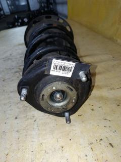 Стойка амортизатора на Toyota Voxy ZRR70G 3ZR-FAE Фото 2