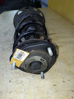 Стойка амортизатора на Toyota Voxy ZRR70G 3ZR-FAE Фото 2