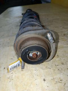 Стойка амортизатора 280 697, 30-B10-A, 333267, CR-049FL-DW, CR8902, DC2034900, DC2037900, DC2234900, DC3534900, DC3734900, SST0045, ST-049FL-DW на Mazda Demio DW3W B3 Фото 2