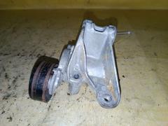 Ролик натяжной на Nissan Note E12 HR12DDR Фото 2