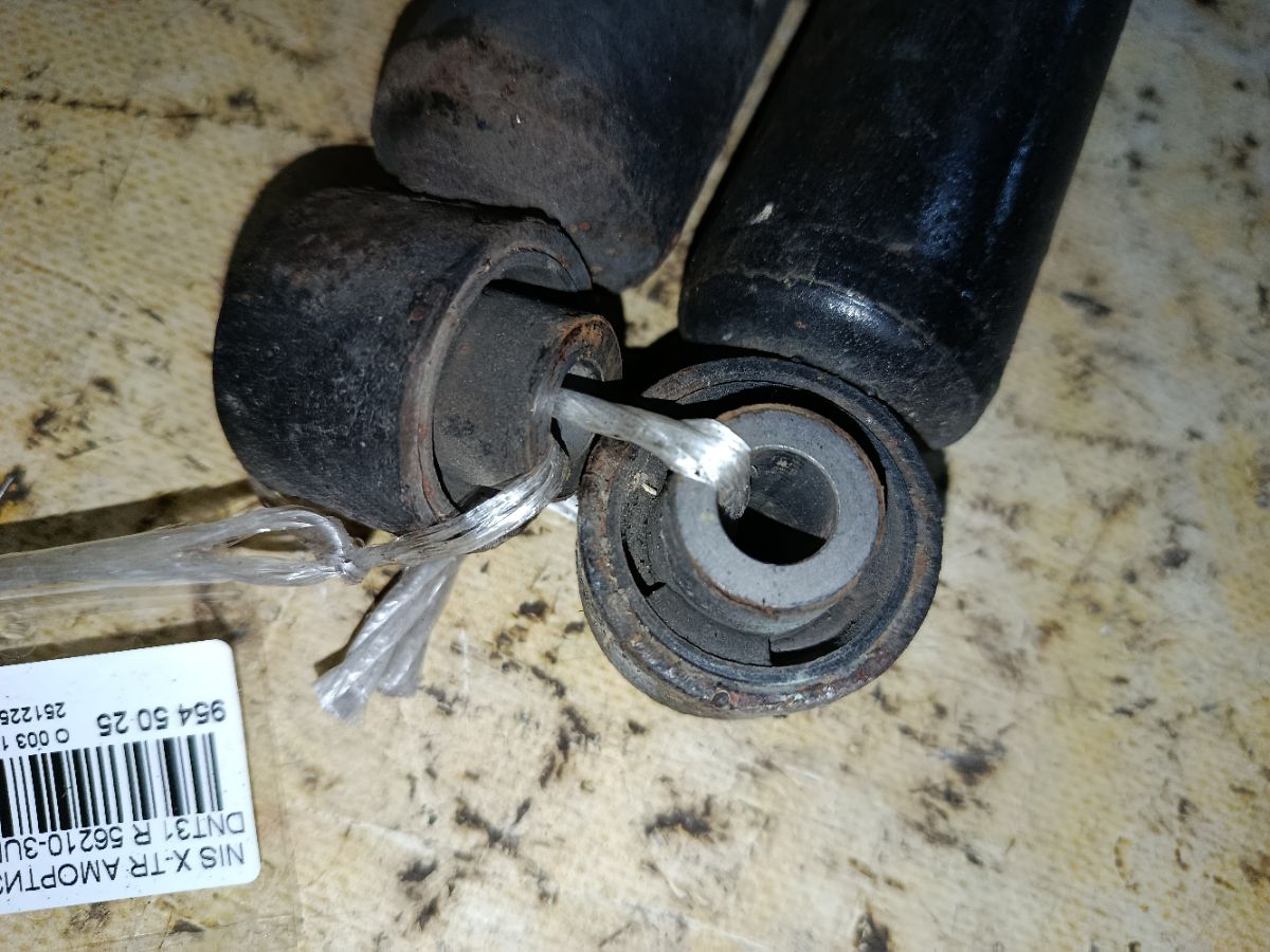 Амортизатор 56210-3UB0A на Nissan X-Trail DNT31 Фото 3