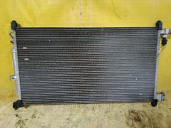 Радиатор кондиционера на Nissan March AK12 CR12DE