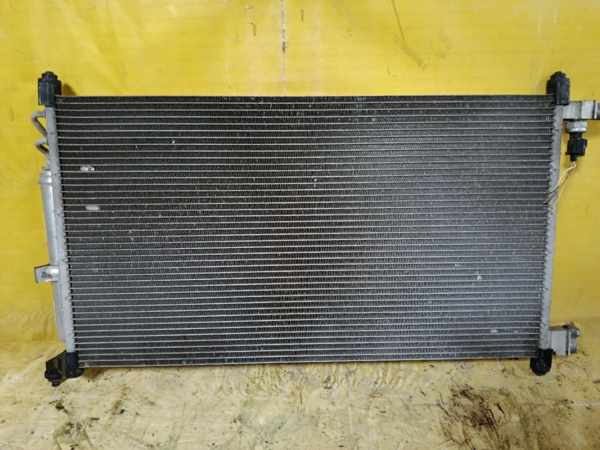 Радиатор кондиционера на Nissan March AK12 CR12DE Фото 1