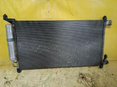 Радиатор кондиционера на Nissan March AK12 CR12DE