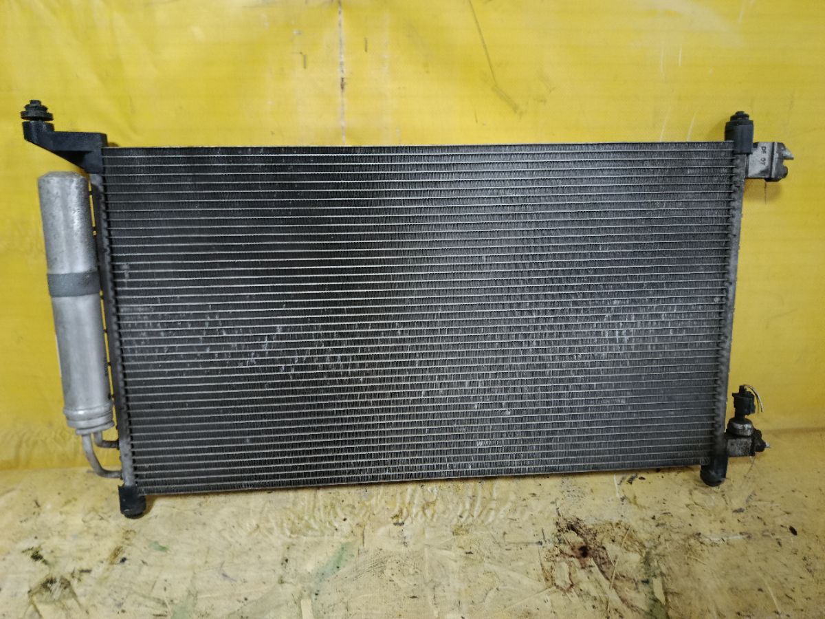 Радиатор кондиционера на Nissan March AK12 CR12DE Фото 1