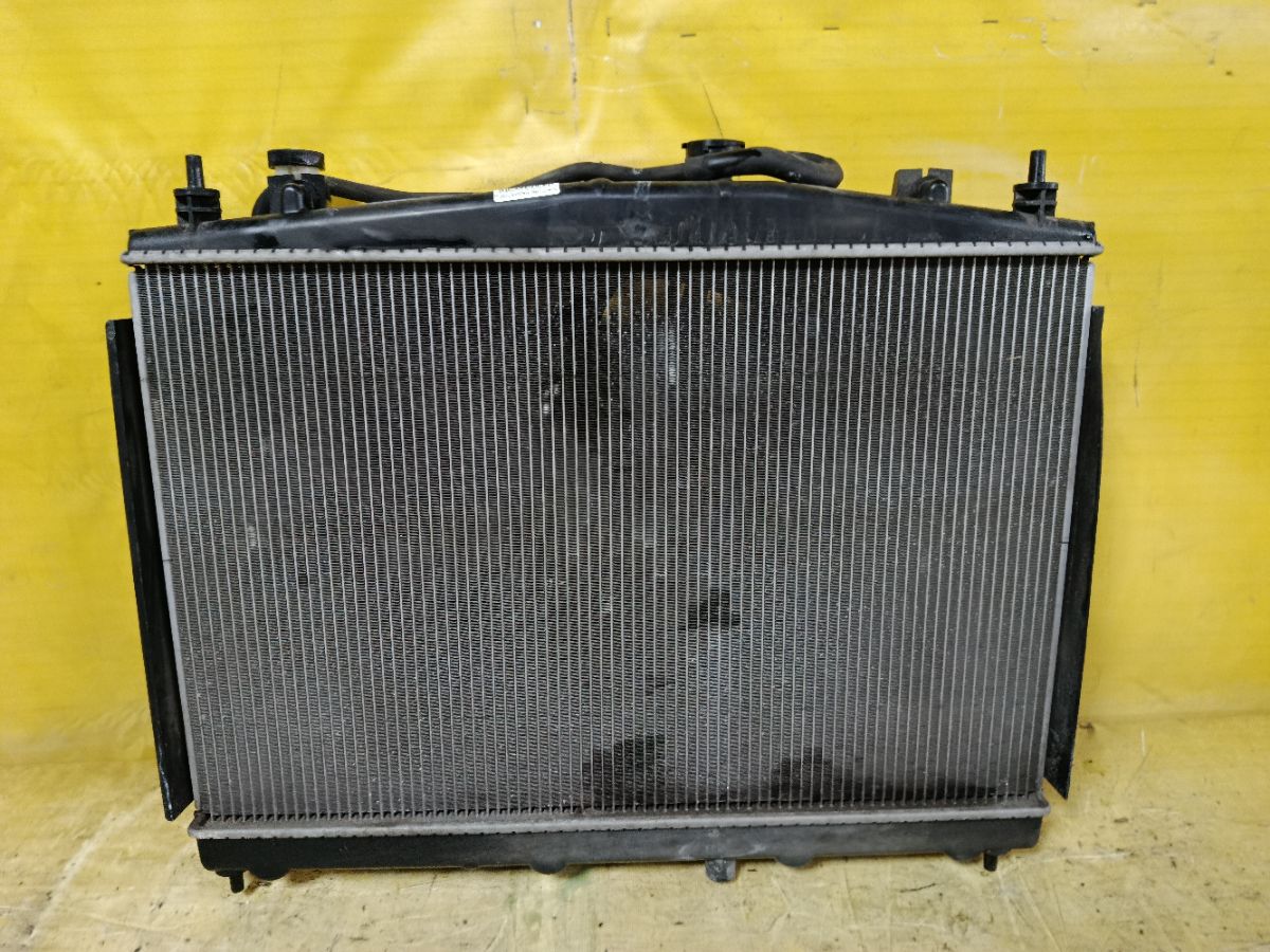 Радиатор ДВС 019M68, 070159N, 107175, 13002338, 214101FD0A, 214101FD5A, 214101JY0A, 21410EE000, 21410EW000, 271308-3, 271308-4, 2713083K, 2713083X, 272338R, 3341-8507, 37556, 58236, 60132338, 68741, 701583, CU13127, DA2803, DAP280003, DCM1878, DN2338, DRM46040, FP 50 A840-X, GD7905, LRC 141EE, N656-69, NIS010, NS0001-G11, NSY121216, PL021939, RC00322, STR0019, STR0119, TD-036-13127-16, WG1723220 на Nissan Cube Z12 HR15DE Фото 1