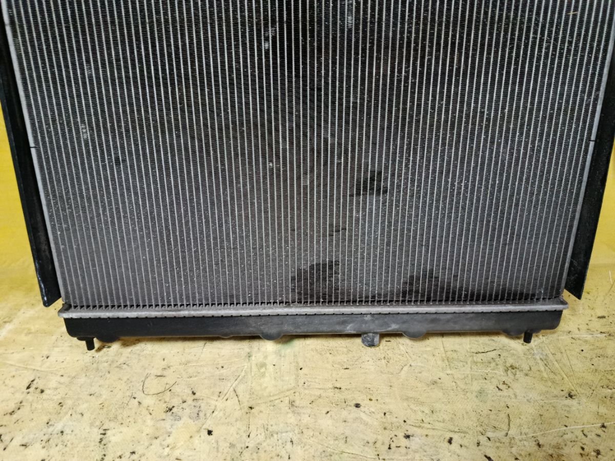 Радиатор ДВС 019M68, 070159N, 107175, 13002338, 214101FD0A, 214101FD5A, 214101JY0A, 21410EE000, 21410EW000, 271308-3, 271308-4, 2713083K, 2713083X, 272338R, 3341-8507, 37556, 58236, 60132338, 68741, 701583, CU13127, DA2803, DAP280003, DCM1878, DN2338, DRM46040, FP 50 A840-X, GD7905, LRC 141EE, N656-69, NIS010, NS0001-G11, NSY121216, PL021939, RC00322, STR0019, STR0119, TD-036-13127-16, WG1723220 на Nissan Cube Z12 HR15DE Фото 2