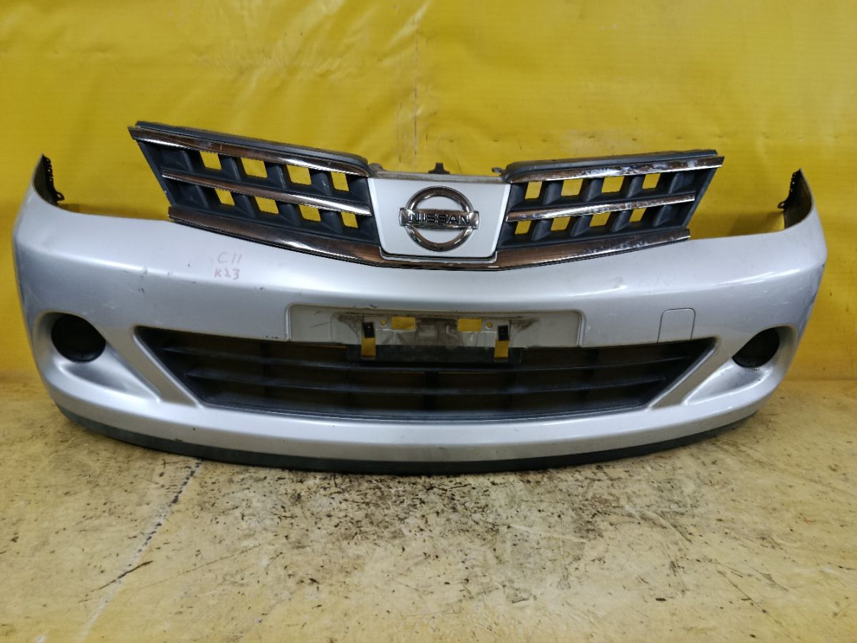 Бампер 62022-ED025, 62022ED025, 62022ED540, 62022EM00J, DS04213BA, DS04232BA, DS04232BB, DT20100000000, DT20200001000, GD6930, HQ62022EM00J, NS01001DB, NSL10507507, STDTW5000A0, U0505084, UNTEM622294 на Nissan Tiida C11 Фото 1