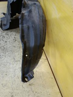 Подкрылок 63842-3VA0A на Nissan Note E12 HR12DDR Фото 3