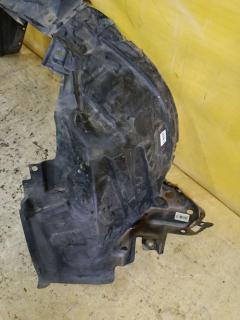 Подкрылок 63843-3VA0A на Nissan Note E12 HR12DDR Фото 2