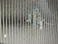 Радиатор ДВС 01153043, 028M89, 1025151SX, 102957, 130225, 1460-0127, 16400-0J020, 16400-21060, 16400-21070, 16400-21070-N1, 16400-21070-R1, 16400-21080, 16400-21081, 16400-21090, 16400-21120, 16400-21121, 1640021060, 1640021070, 164002107087, 1640021071, 1640021080, 16403-0J020, 2060347, 2061046, 2064058, 2064073, 2065108, 210031N, 284798T, 284799H, 284799HA, 284799T, 29170, 29170A, 29340, 31-1125, 34611011, 350213103700, 366000, 53002259, 53212, 60532259, 6112177N, 64799, 64799A, 734841, 810308-4, 8103084K, 8109302258, 8109302287, 812259R, 8660551, 8660553, 8MK 376 748-351, 8MK 376 773-471, ACRB142, ADT39859, CR 1523 000S, CU2305, DA15110CHK, DAP151010CHK, DCM3214, DRM50080, FP 70 A534, FP 70 A534-X, FX-036-8054, FX-036-8054A, JAPRDA153043, JPR0030, KTO259, LH2305(16)A/T, LRC 1907, NC01076053B, NC01076054B, NDT-1121, PL010863, PRS3538, RA2405, RA64799, RA64799A, RA64799Q, RB2927, RD4446, RDA153043, STR0159, STR0160, STTY000W10, T156A59, T553-16, T789-01, TD-036-8054, TD-036-8054A, TO-0195-16, TO2259, TOY0W10, TY-NCP-1216, TY000W10, TY01100501000, TY37062A, TYNCP1216, TYV1005B0, TYYAS99-912, TYYAS99-913, TYYAS99912, VCS4799, WG1722143 на Toyota Succeed NCP55V 1NZ-FE Фото 2