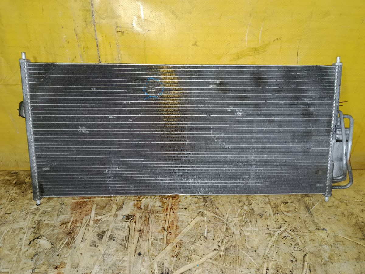 Радиатор кондиционера на Nissan Wingroad WFY11 QG15DE Фото 1