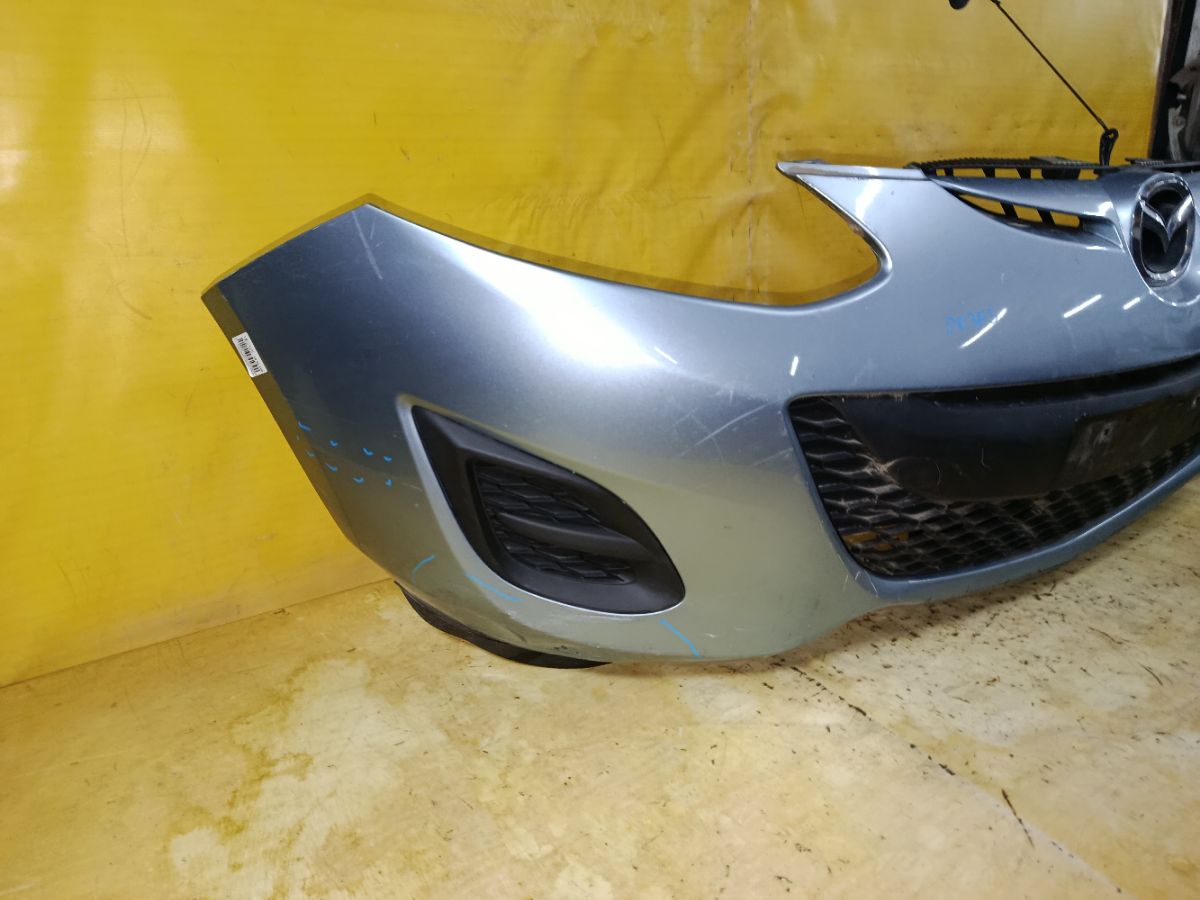 Бампер DR61-50031, 038D65150031C8N, 25301967, 2741570, 3421901, 5605050, 931104, D65150031B8H, D65150031BAA, D65150031C8N, D65150031CAA, D65150031CBB, MZ04105BA, MZ04105BAV, MZ04105BB, MZ51100000000, STMZ520000 на Mazda Demio DE3FS Фото 2