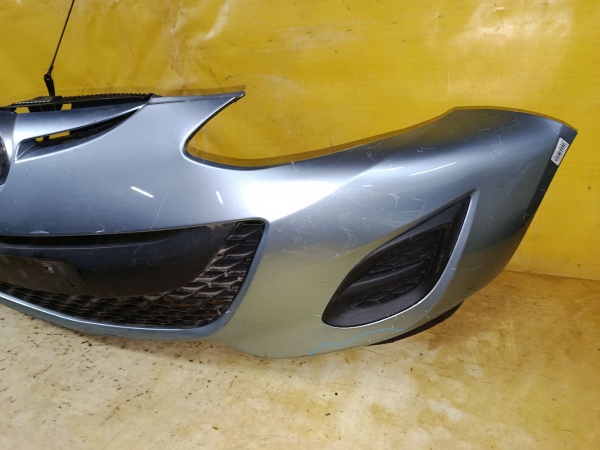 Бампер DR61-50031, 038D65150031C8N, 25301967, 2741570, 3421901, 5605050, 931104, D65150031B8H, D65150031BAA, D65150031C8N, D65150031CAA, D65150031CBB, MZ04105BA, MZ04105BAV, MZ04105BB, MZ51100000000, STMZ520000 на Mazda Demio DE3FS Фото 3