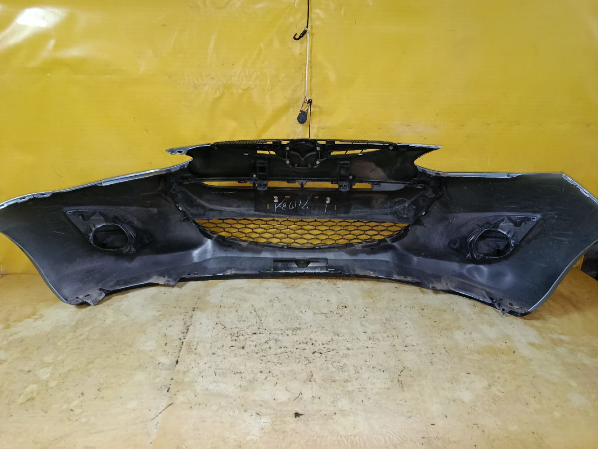 Бампер DR61-50031, 038D65150031C8N, 25301967, 2741570, 3421901, 5605050, 931104, D65150031B8H, D65150031BAA, D65150031C8N, D65150031CAA, D65150031CBB, MZ04105BA, MZ04105BAV, MZ04105BB, MZ51100000000, STMZ520000 на Mazda Demio DE3FS Фото 4