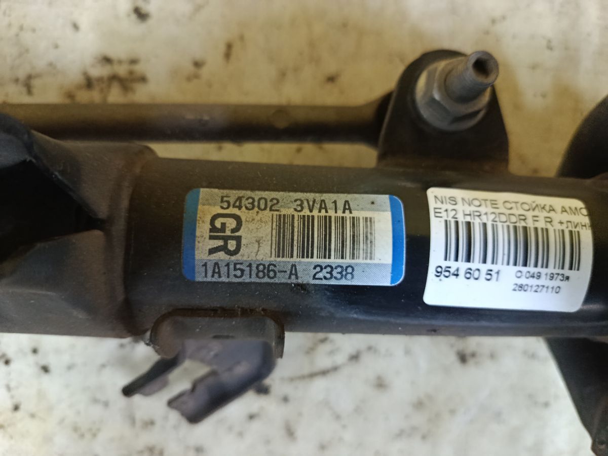 Стойка амортизатора на Nissan Note E12 HR12DDR Фото 5