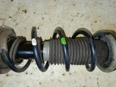 Стойка амортизатора на Nissan Note E12 HR12DDR Фото 3