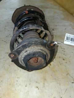 Стойка амортизатора на Nissan Leaf AZE0 EM57 Фото 2