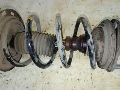 Стойка амортизатора на Toyota Voxy ZRR70G 3ZR-FAE Фото 3