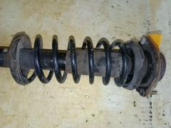 Стойка амортизатора 280 697, 30-B10-A, 333267, CR-049FL-DW, CR8902, DC2034900, DC2037900, DC2234900, DC3534900, DC3734900, SST0045, ST-049FL-DW на Mazda Demio DW3W B3 Фото 3