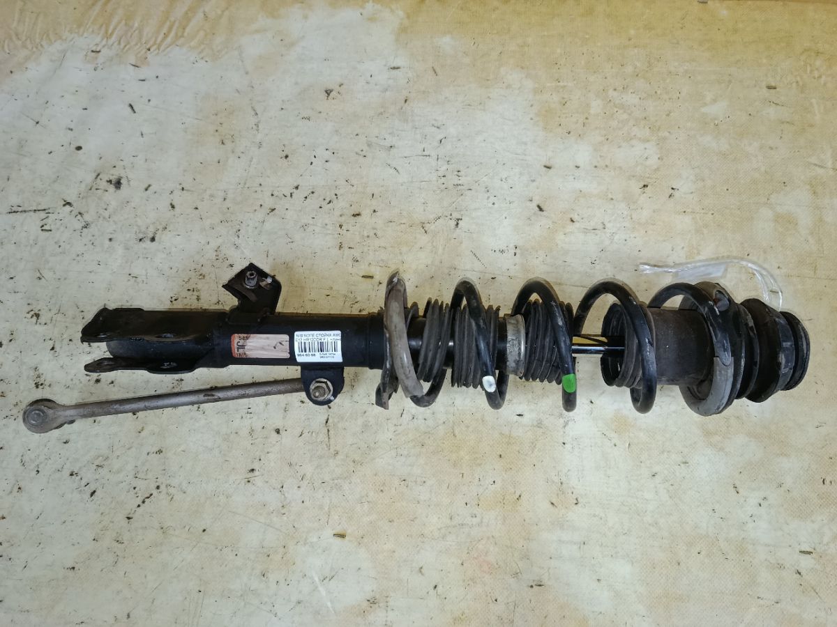 Стойка амортизатора на Nissan Note E12 HR12DDR Фото 1