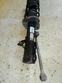 Стойка амортизатора на Nissan Note E12 HR12DDR Фото 4