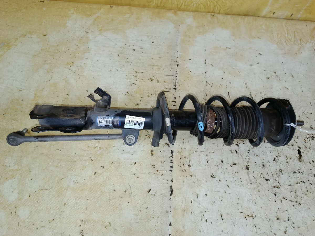 Стойка амортизатора на Nissan Note E12 HR12DDR Фото 1