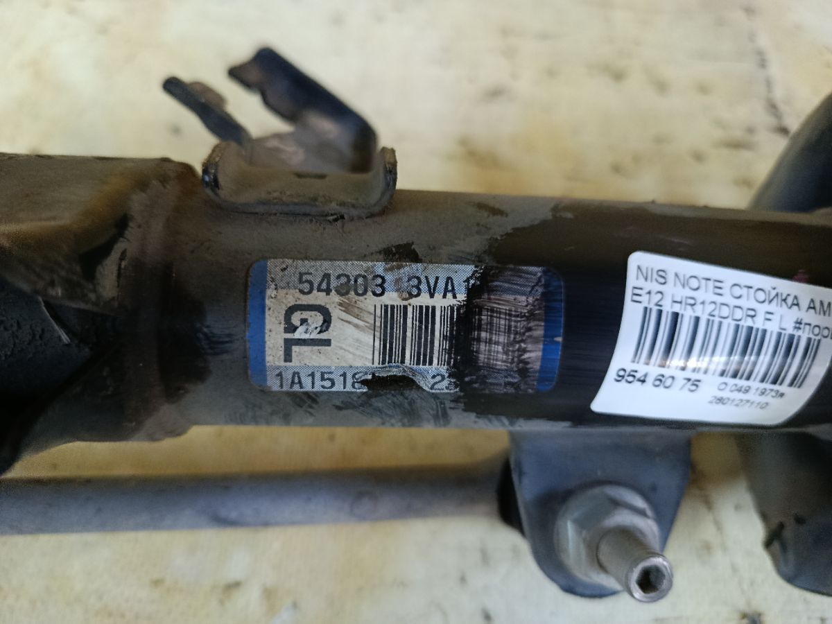 Стойка амортизатора на Nissan Note E12 HR12DDR Фото 5