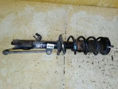 Стойка амортизатора на Nissan Note E12 HR12DDR, Переднее Левое расположение