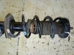 Стойка амортизатора на Nissan Note E12 HR12DDR Фото 3