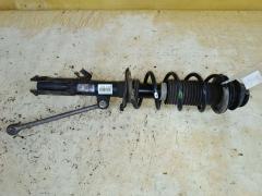 Стойка амортизатора на Nissan Note E12 HR12DDR, Переднее Левое расположение