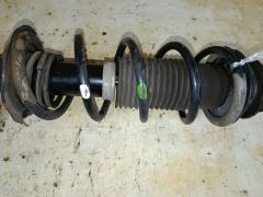 Стойка амортизатора на Nissan Note E12 HR12DDR Фото 3