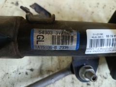 Стойка амортизатора на Nissan Note E12 HR12DDR Фото 5