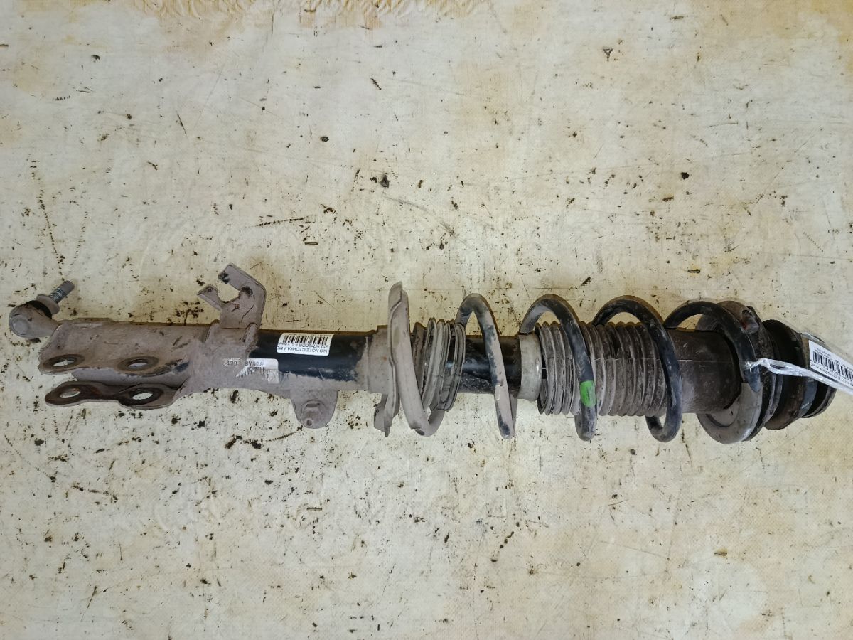 Стойка амортизатора на Nissan Note E12 HR12DDR Фото 1