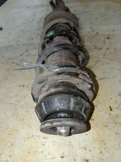 Стойка амортизатора на Nissan Note E12 HR12DDR Фото 2