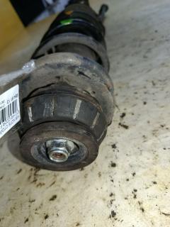 Стойка амортизатора на Nissan Note E12 HR12DDR Фото 2