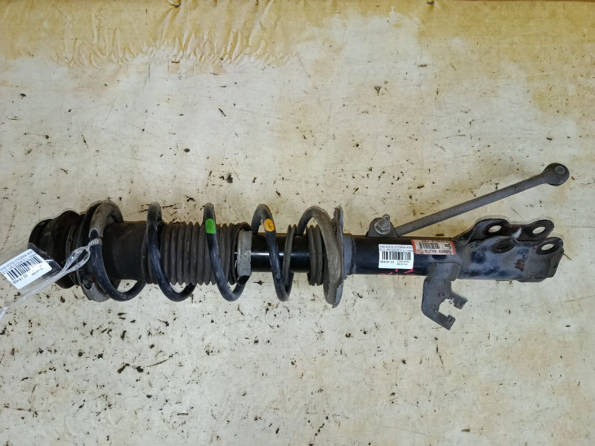 Стойка амортизатора на Nissan Note E12 HR12DDR Фото 1